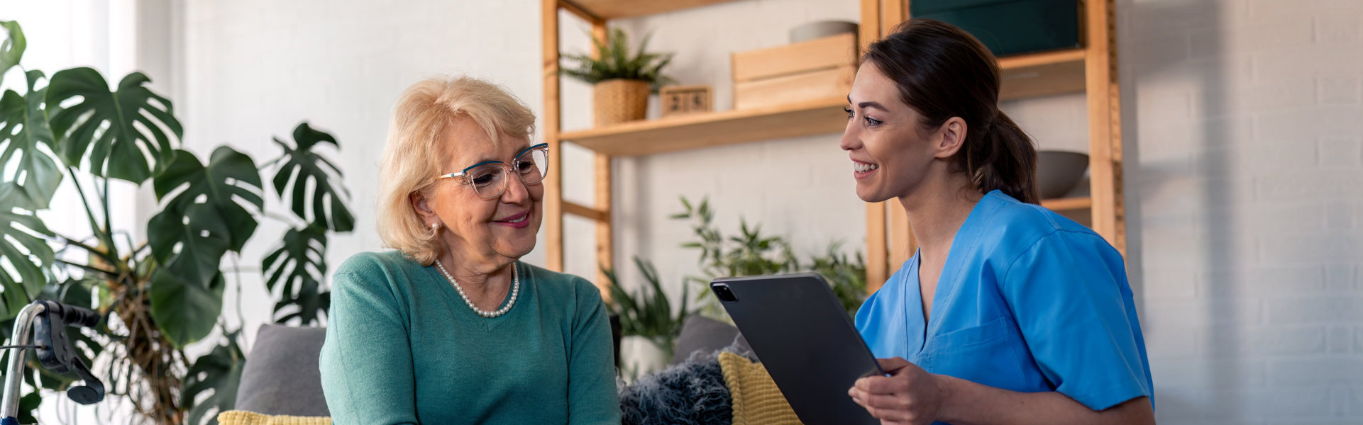 caregiver and elderly woman talking